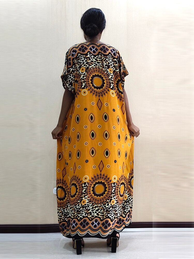 Traditional African Woman dress with 'modern reflection of wild life in leopard pattern'