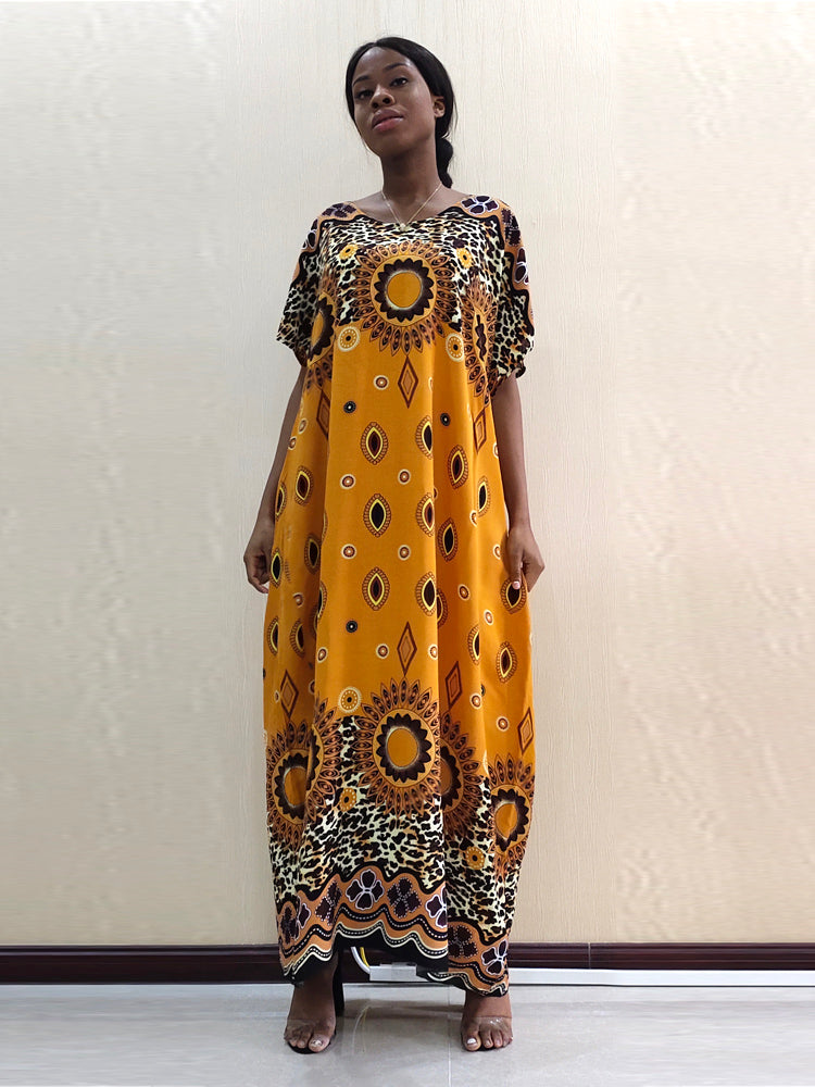 Traditional African Woman dress with 'modern reflection of wild life in leopard pattern'